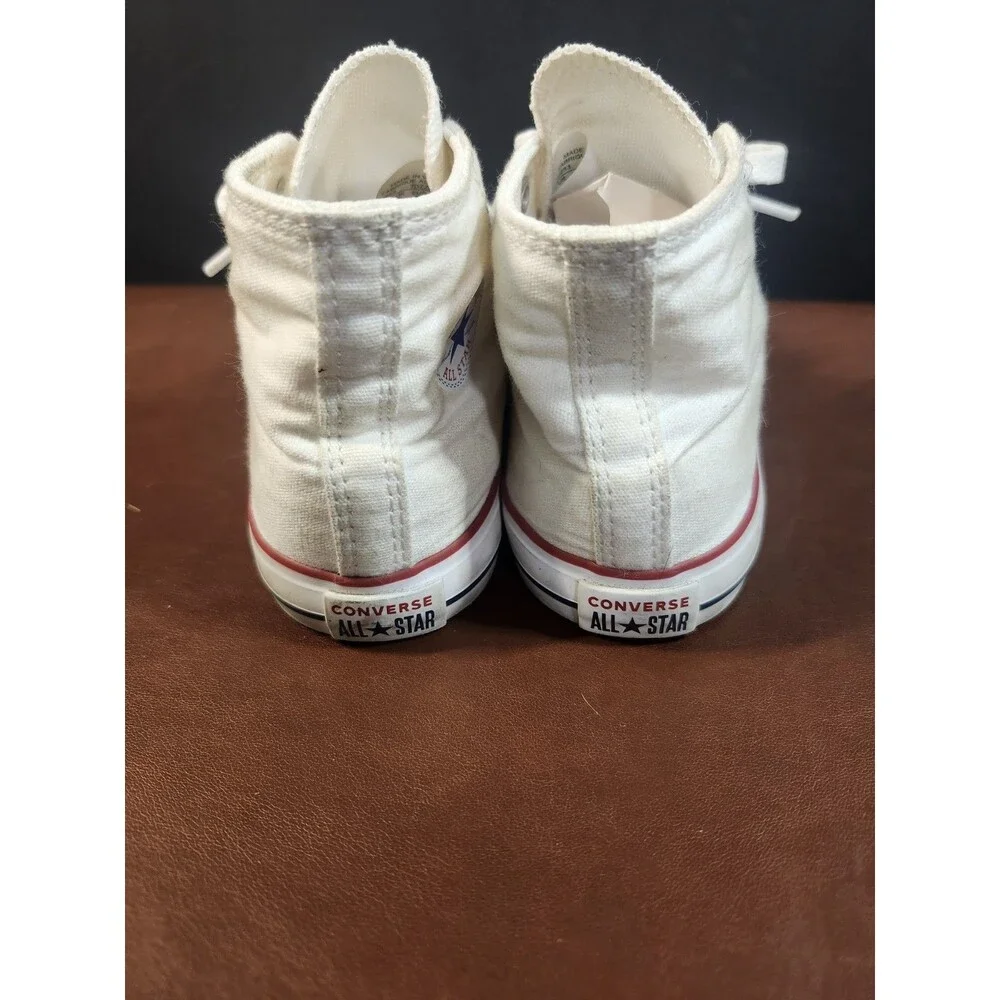 white canvas Converse Chuck Taylor All Star high-top sneakers